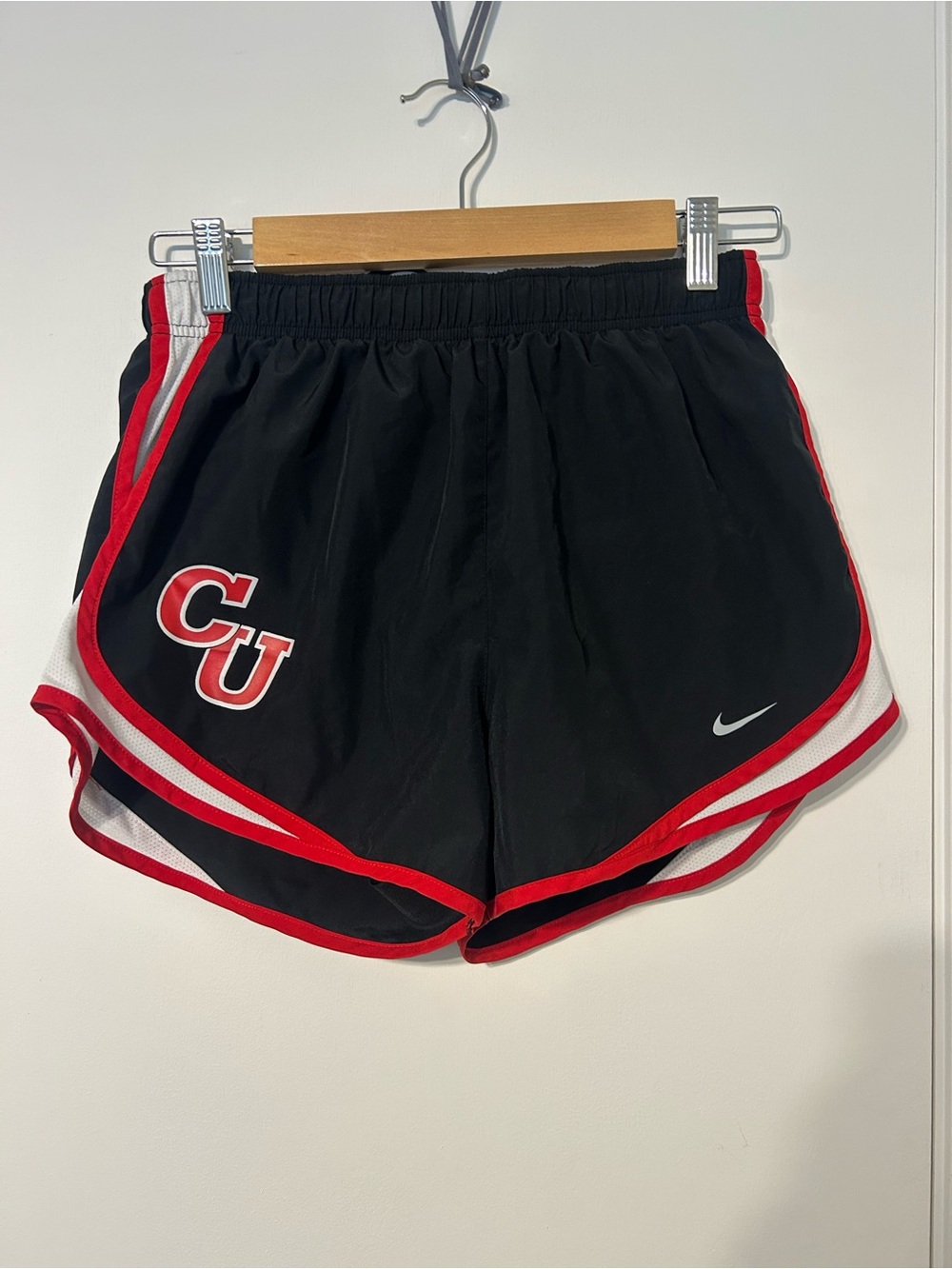 Nike Women’s Black Athletic Shorts with Red Trim and White Accents